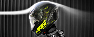 Why do motorcycle helmets have spoilers?